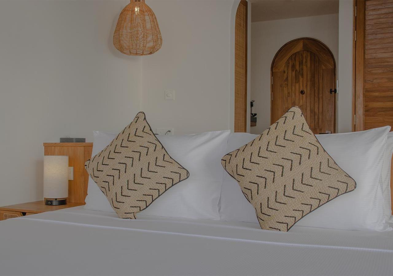 Stone Hotels Dhiffushi Bagian luar foto